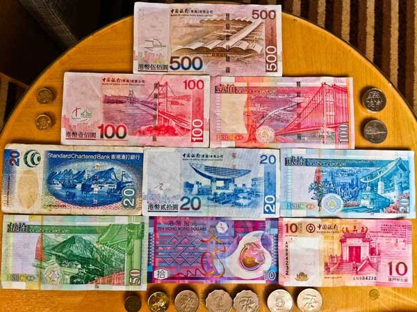 Hong Kong dollar banknotes and coins from several issuing banks