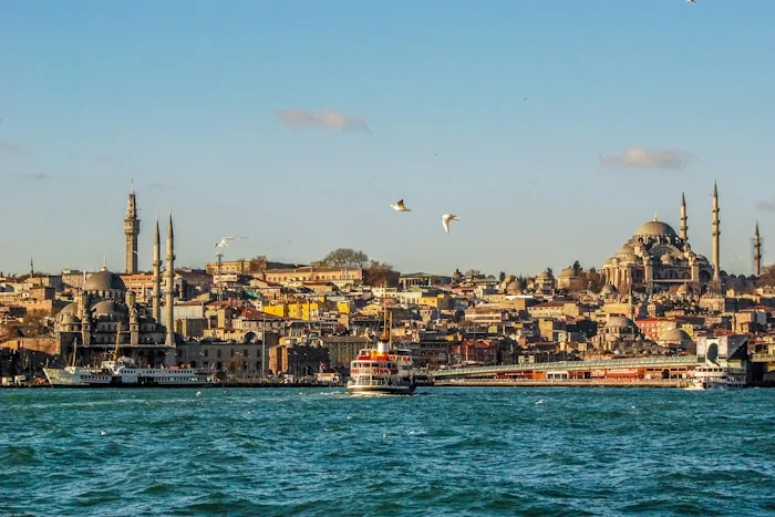 Ferries on the Bosphorus with the Istanbul skyline behind