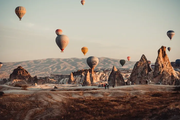 Hot air balloons above the rock formations of Cappadocia