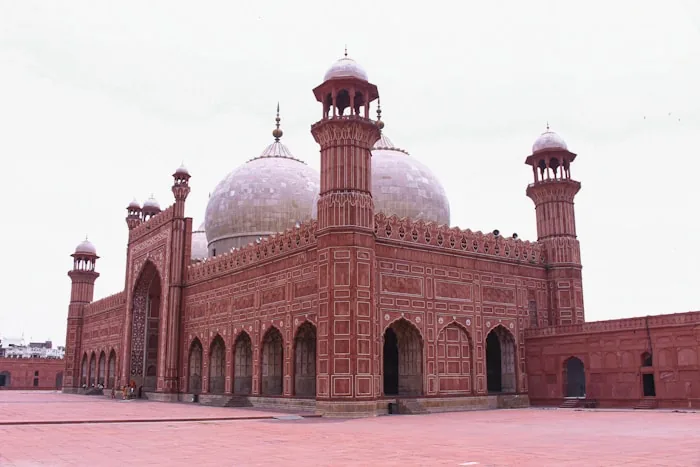 The red sandstone facade of the Badshahi Mosque in Lahore