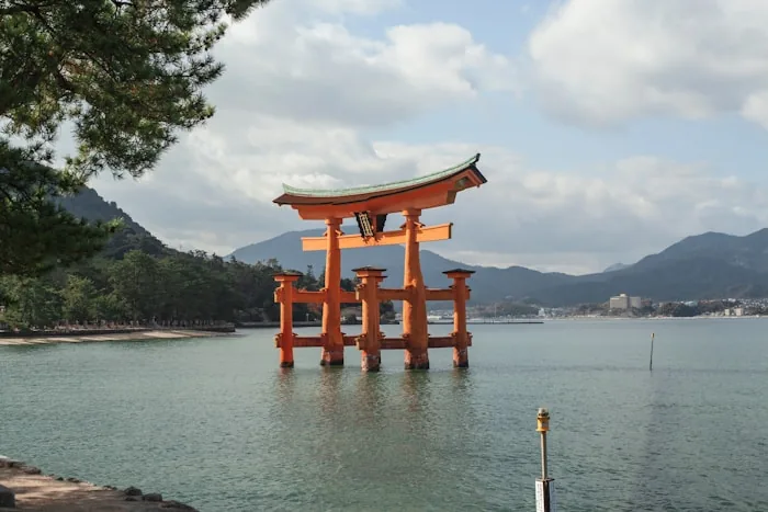 The floating torii gate of Itsukushima Shrine standing in the sea at Miyajima