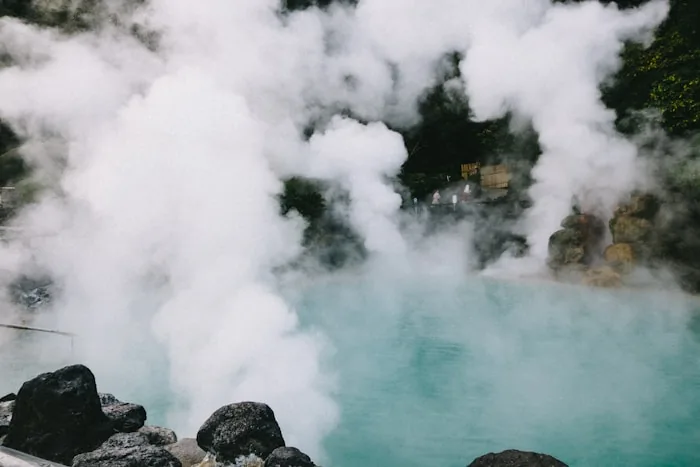 Steam rising from a natural hot spring in Japan