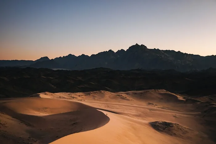 Sand dunes and mountains in the Saudi Arabian desert