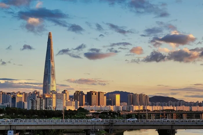 The Seoul skyline at dusk with the Lotte World Tower